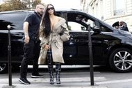 Kim Kardashian and her bodyguard Pascal Duvier in Paris - Source: Getty Photo by Mehdi Taamallah/